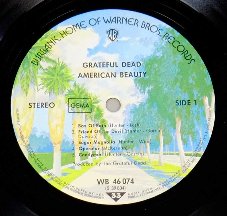 Close up of record's label GRATEFUL DEAD - American Beauty German Release 12" LP Vinyl Album Side One