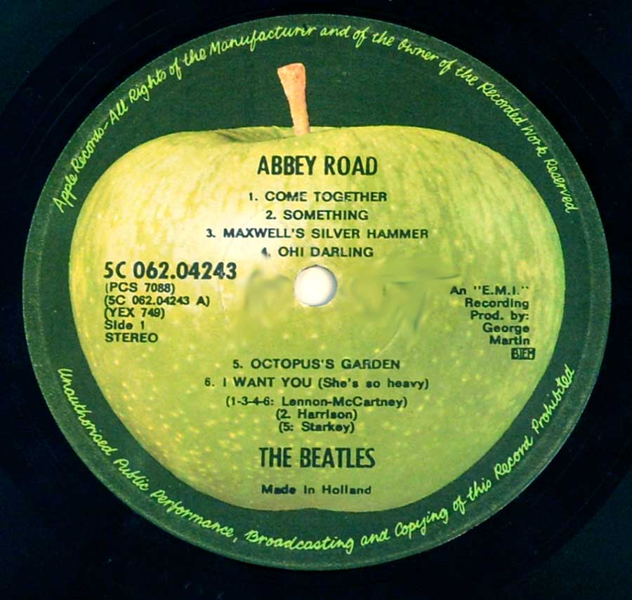 Close up of record's label BEATLES - Abbey Road ( Genuine Netherlands release ) 12" Vinyl LP Album Side One