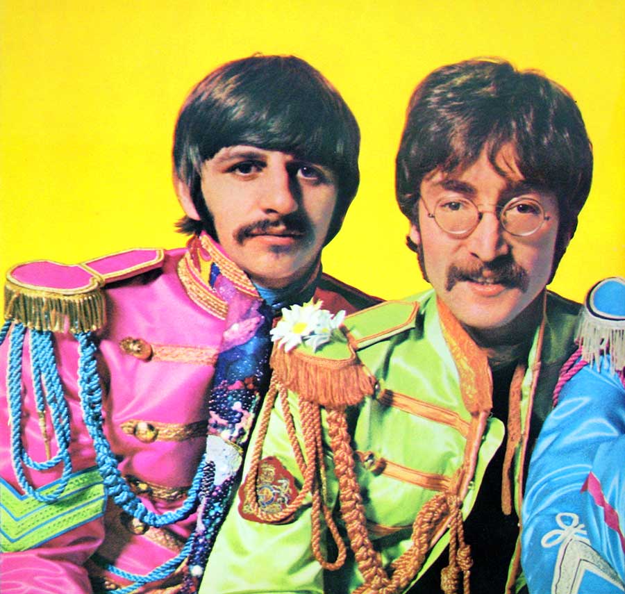 Photo of Ringo Starr and John Lennin on the inside of the cover page  