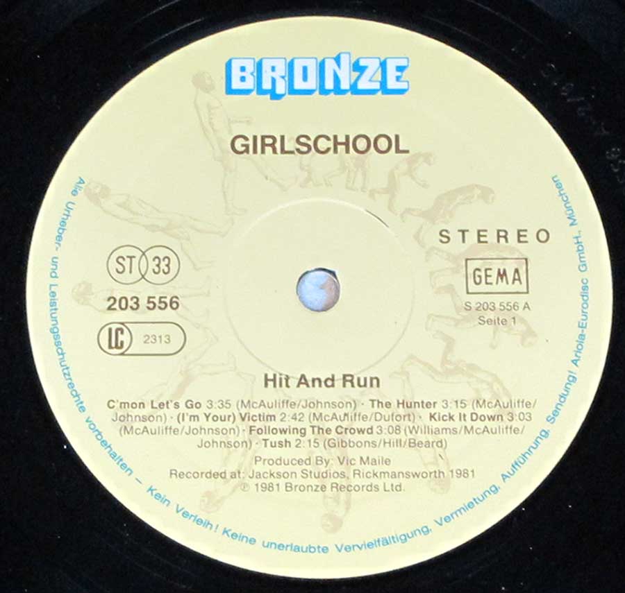 Close up of record's label GIRLSCHOOL - Hit and Run ( British Heavy Metal ) Side One