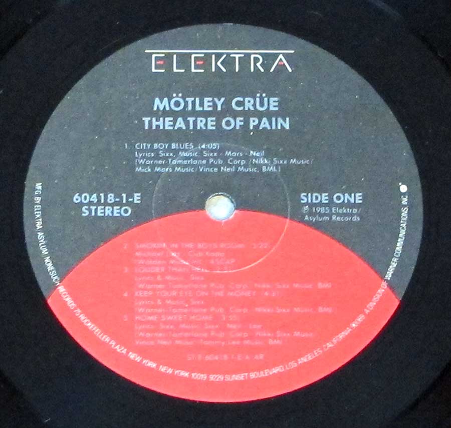 Close up of record's label MÖTLEY CRÜE - Theatre of Pain ( USA ) 12" Vinyl LP Album Side One