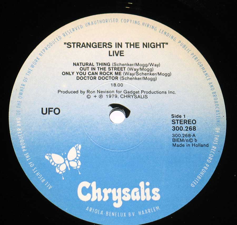 Close-up Photo of Chrysalis White and Blue Record Label of "Strangers in the Night" by "UFO"