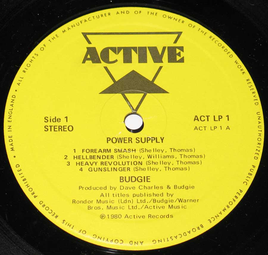 Close up of Side One record's label "Power Supply" Yellow Color ACTIVE Record Label Details: ACT LP 1 ℗ 1980 Active Records Sound Copyright 