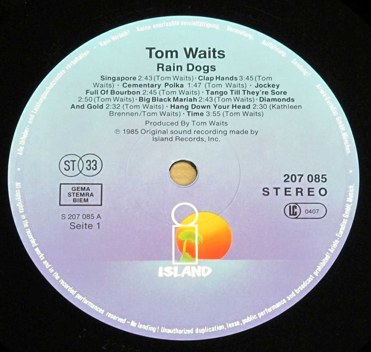 Close-up Photo of "TOM WAITS - Rain Dogs" Record Label 