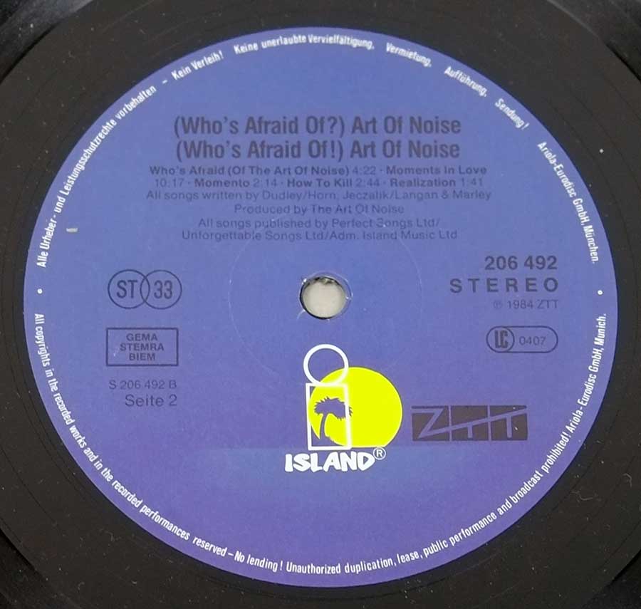 Photo of Dark Blue Record Label of: "Who's Afraid of the Art of Noise"