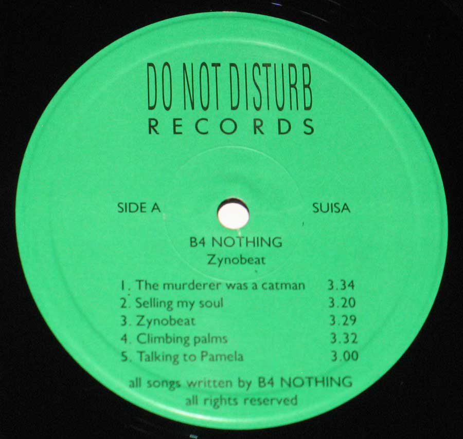 Close-Up of the Green "Do Not Disturb" Records Label