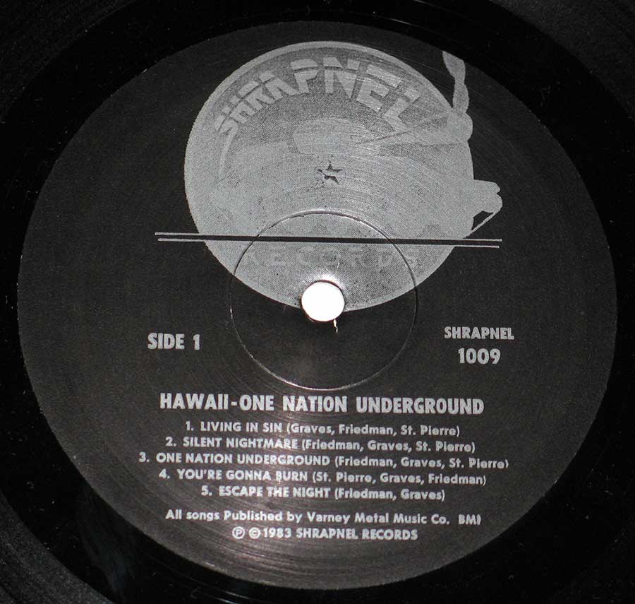 Close up of record's label HAWAII - One Nation Underground Shrapnel 12" LP ALBUM VINYL  Side One