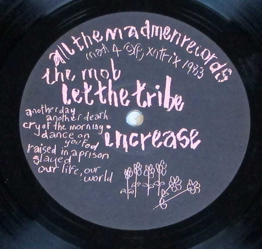 Close up of record's label MOB - Let the Tribe Increase Side Two