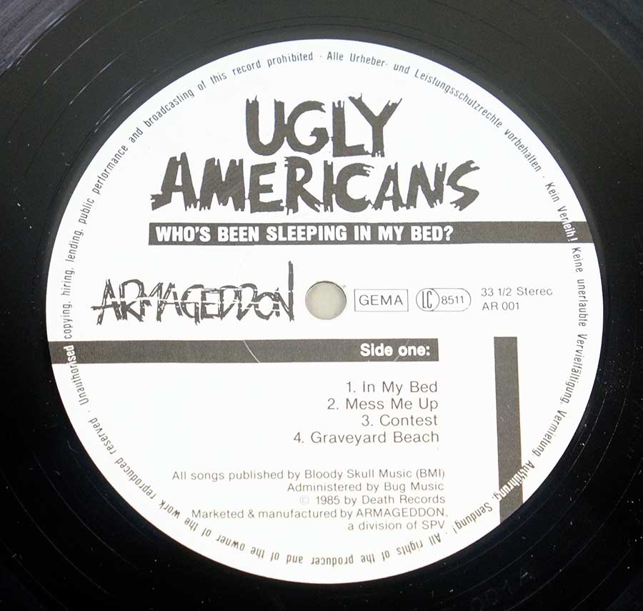Close up of record's label UGLY AMERICANS - Who's Been Sleeping Side One