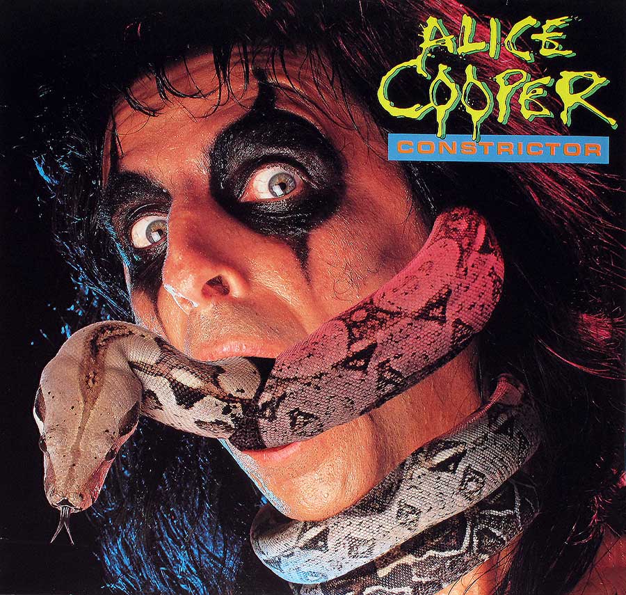 Photo of Alice Cooper with a snake in his mouth on the front cover 