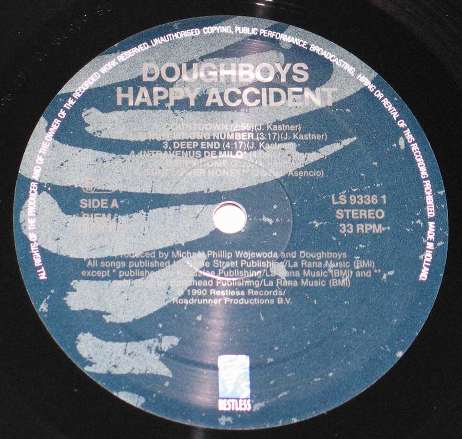 Close up of record's label DOUGHBOYS - Happy Accidents 12" Vinyl LP Album Side One
