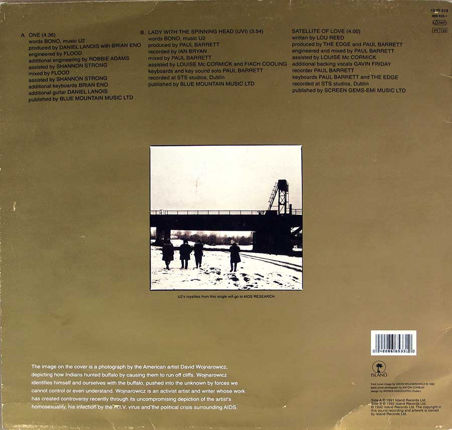 Photo of album back cover U2 - One / Lady with the Spinning Head