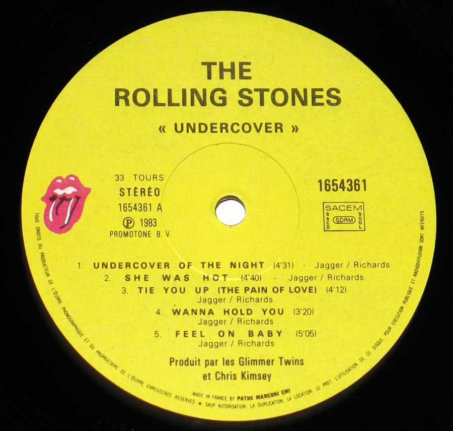 Close up of record's label ROLLING STONES . Undercover French Sexy Album Cover Side One
