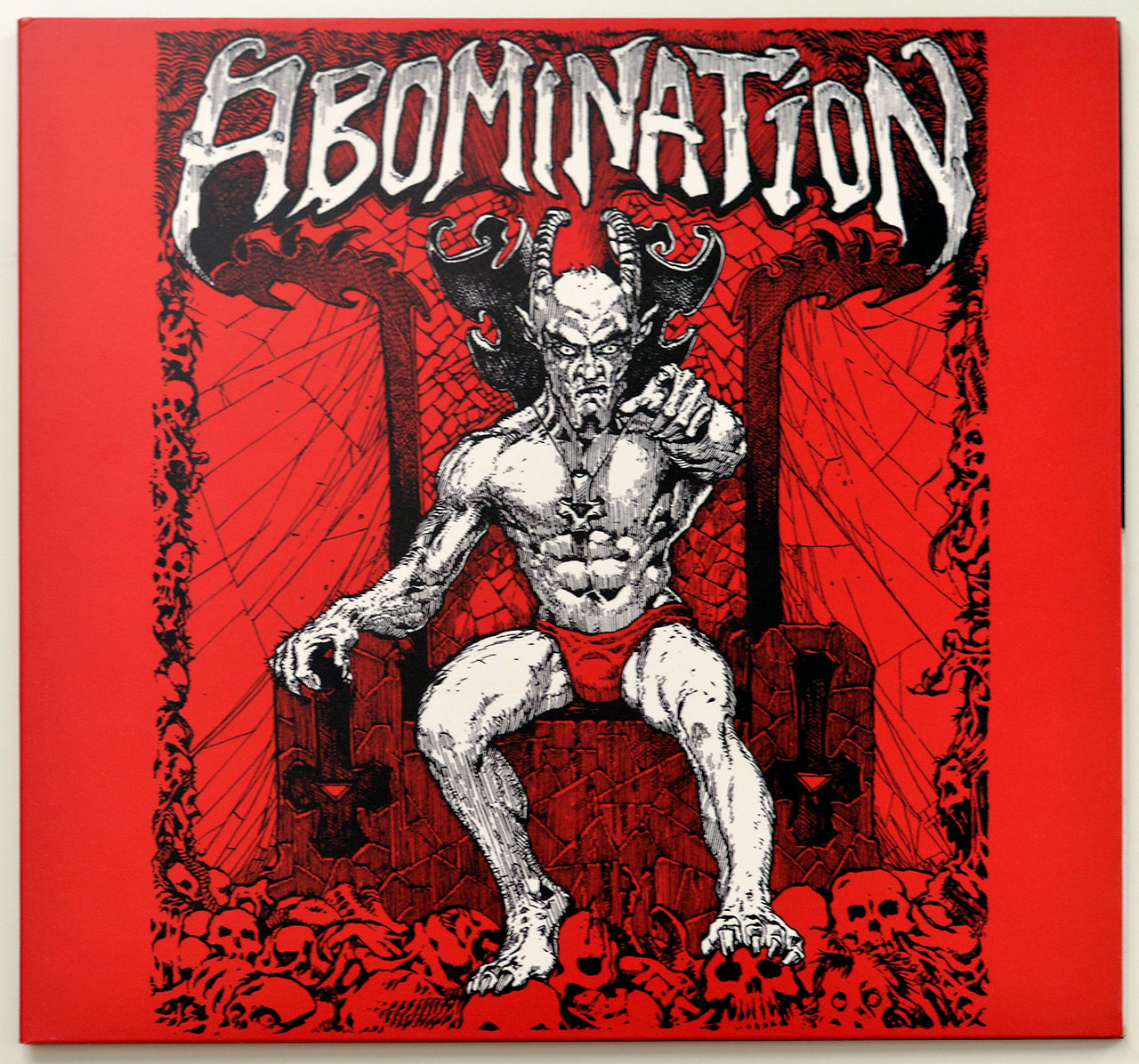 High Resolution Photo Album Front Cover of ABOMINATION Demos https://vinyl-records.nl