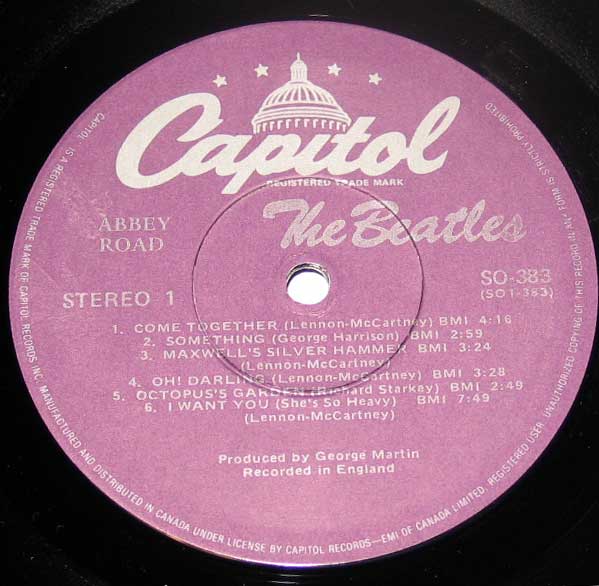 Close-up Photo of "BEATLES Abbey Road Capitol Records" Record Label 