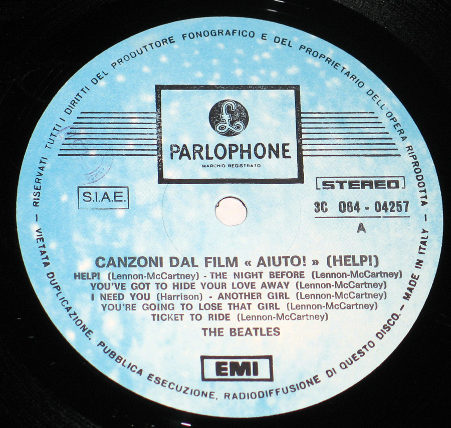 Close up of record's label BEATLES - Help! Canzoni Dal Film Aiuto! 12" Vinyl LP Album Side One