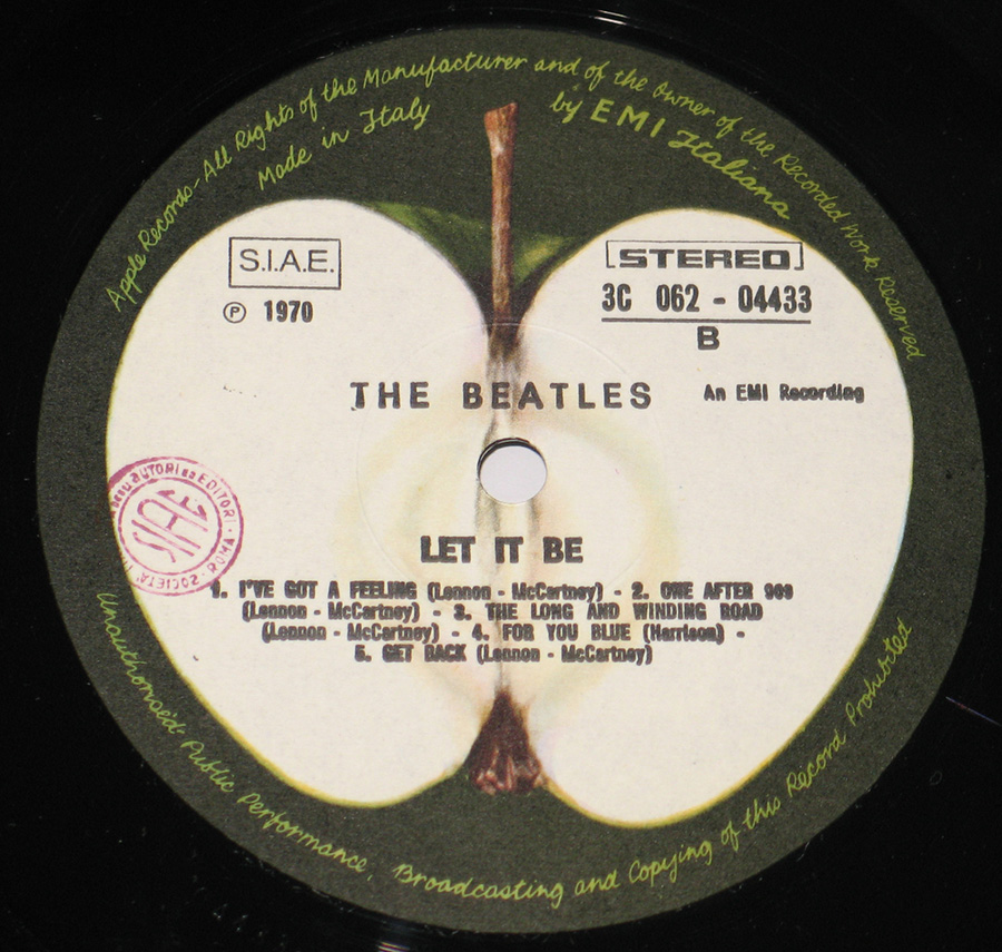Close up of record's label BEATLES - Let It Be Red Apple Logo Italian Release 12" Vinyl LP Album Side One