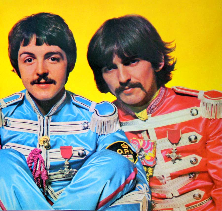 Photo of Paul McCartney and George Harrison on the inside cover page  