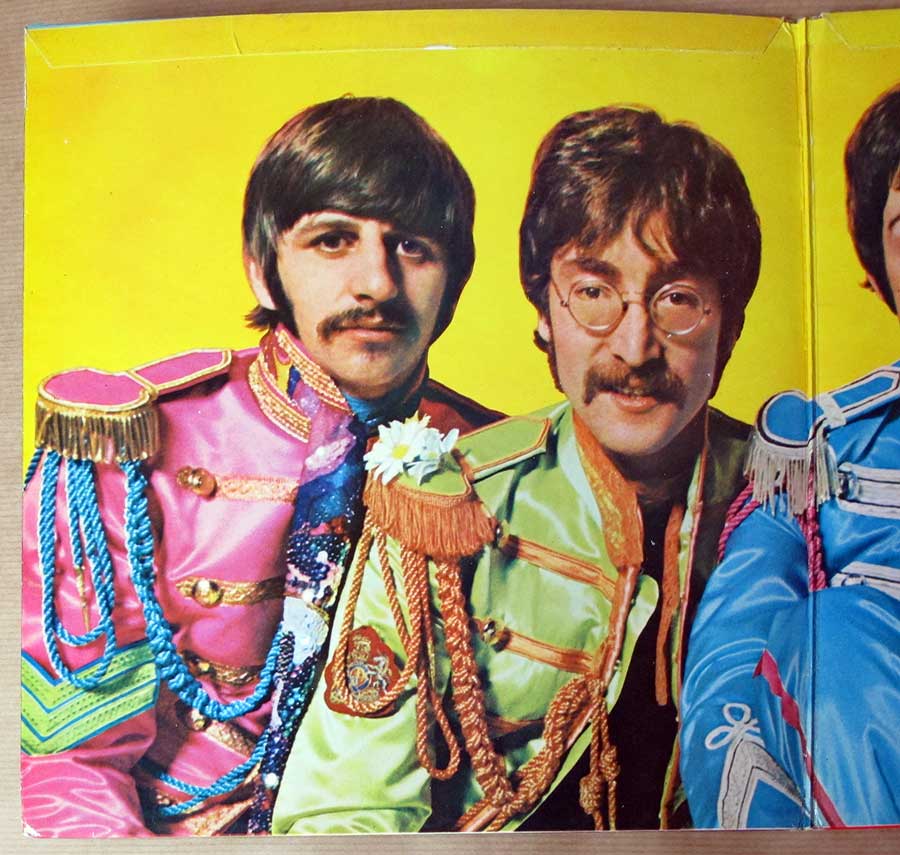 Photo of the left page inside cover THE BEATLES - Sgt Pepper's Lonely Hearts Club Band original UK GB PCS 7027  