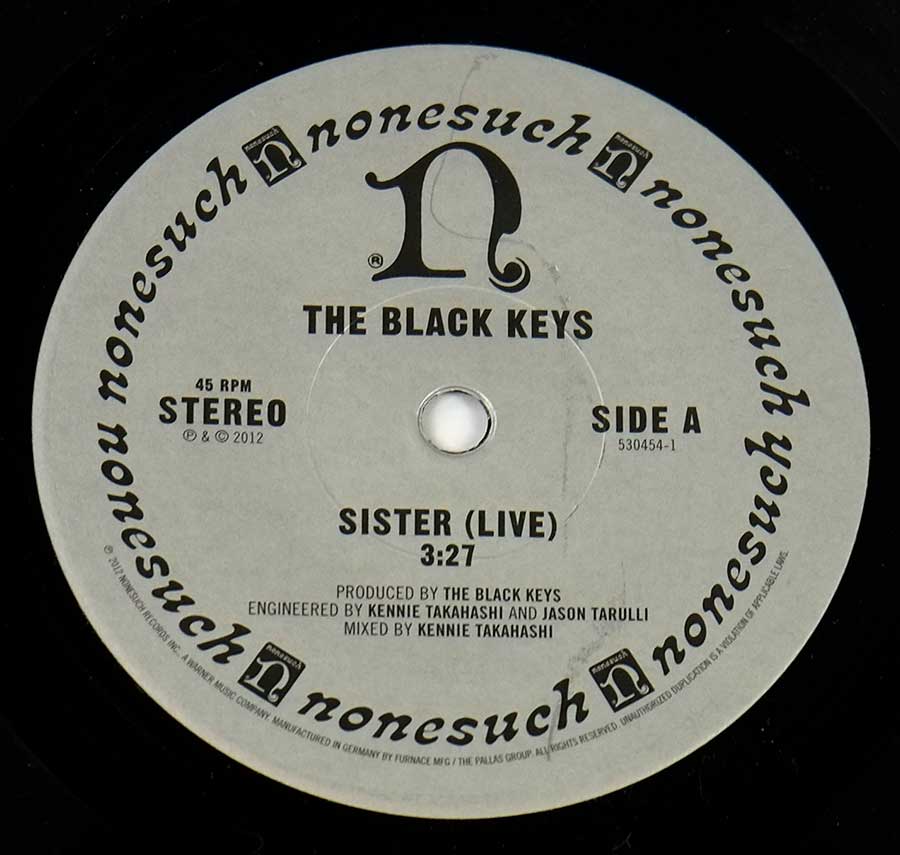 Close up of Side One record's label BLACK KEYS - El Camino 2LP 12" &  7" Single + Large Poster Vinyl Album
