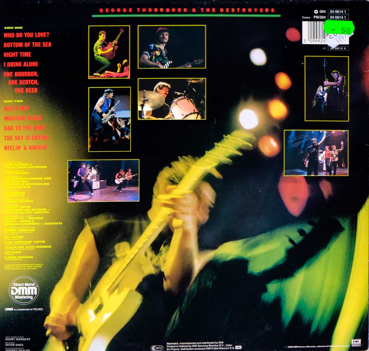Back cover of George Thorogood & The Destroyers' 1986 live album showing a motion-blurred concert photo of Thorogood with inset band photos, tracklist, production credits, barcode, and a green price sticker.