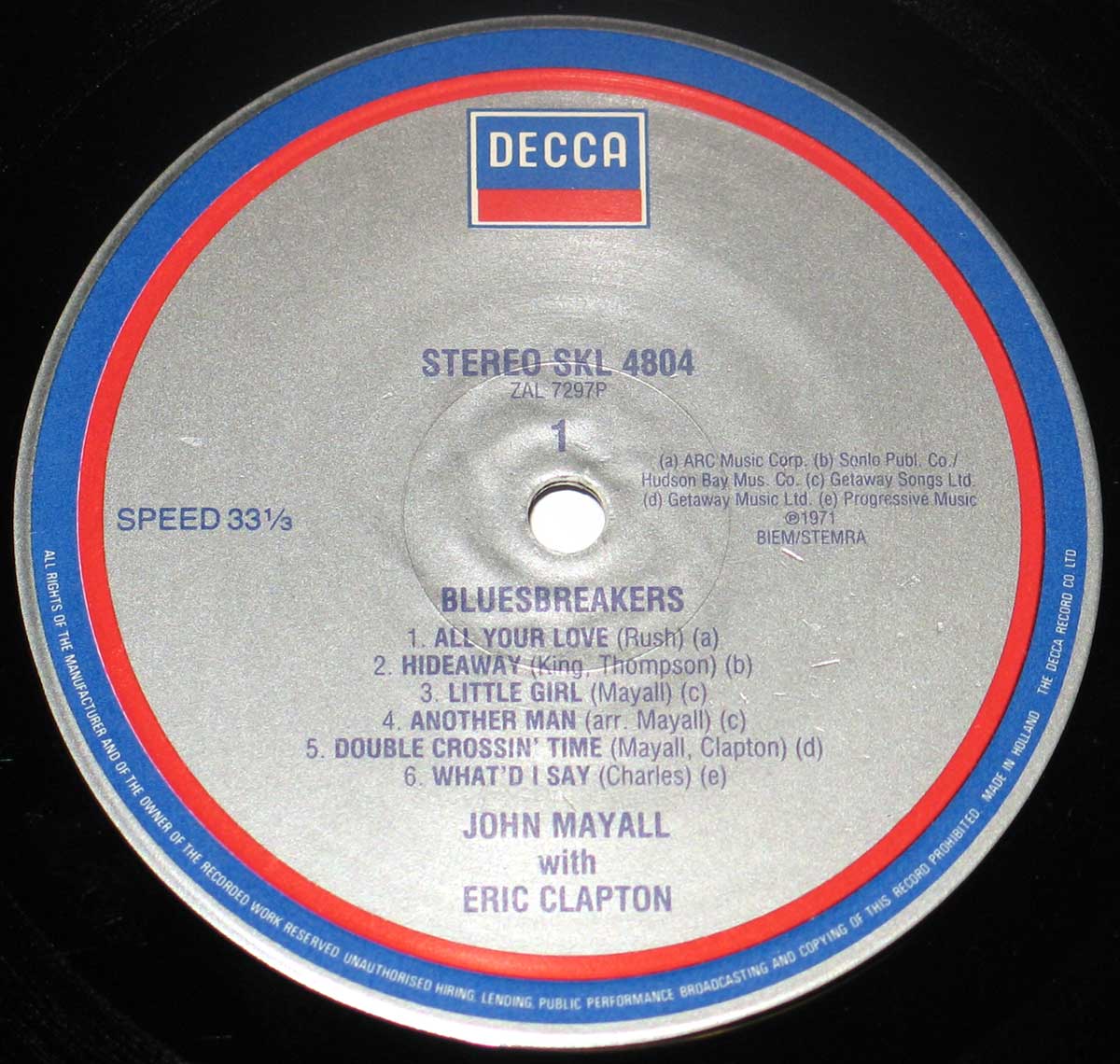 Close up of the Red, Blue and Grey "Decca" Record label of John Mayall Blues Breakers With Eric Clapton album