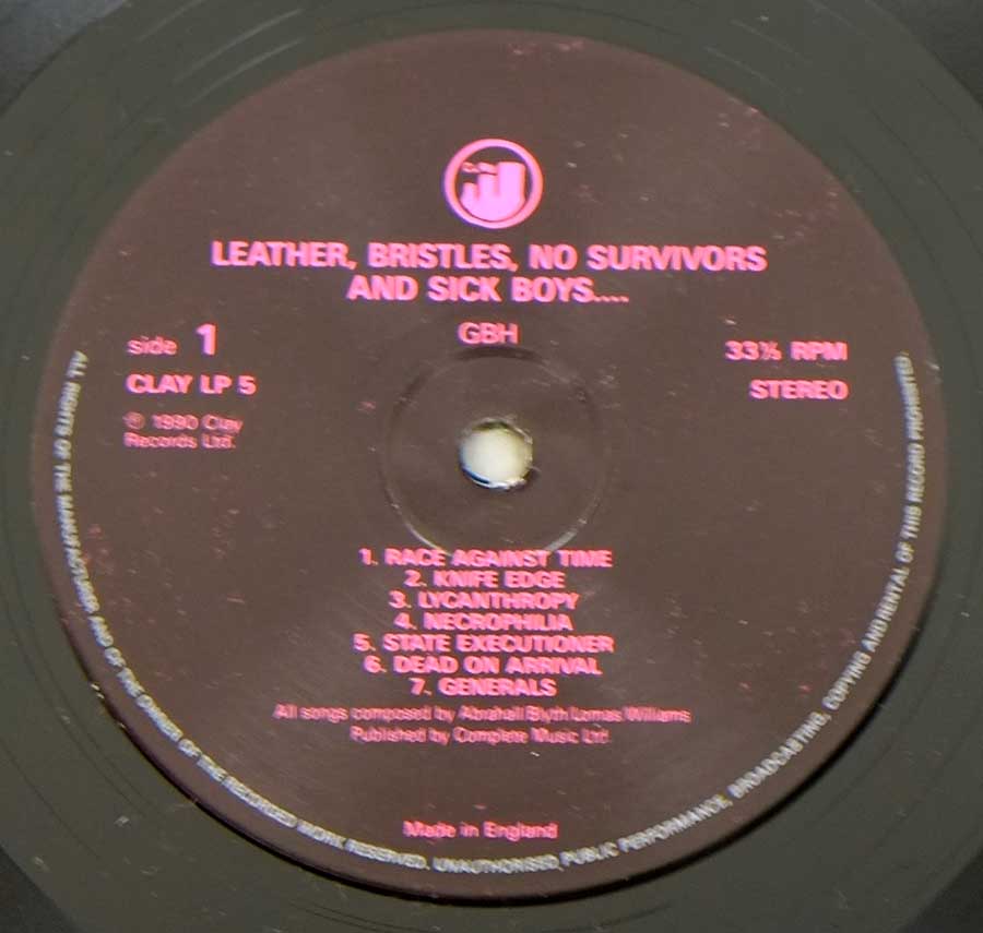 Close up of record's label CHARGED G.B.H. -  Leather Bristles No Survivors And Sick Boys 12" LP Vinyl Album Side One
