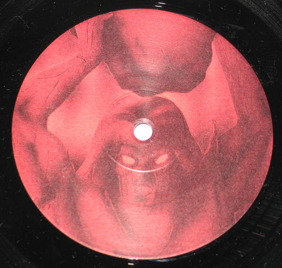 Close up of record's label PROTECTOR - Golem Atom Records 12" Vinyl LP Album Side One