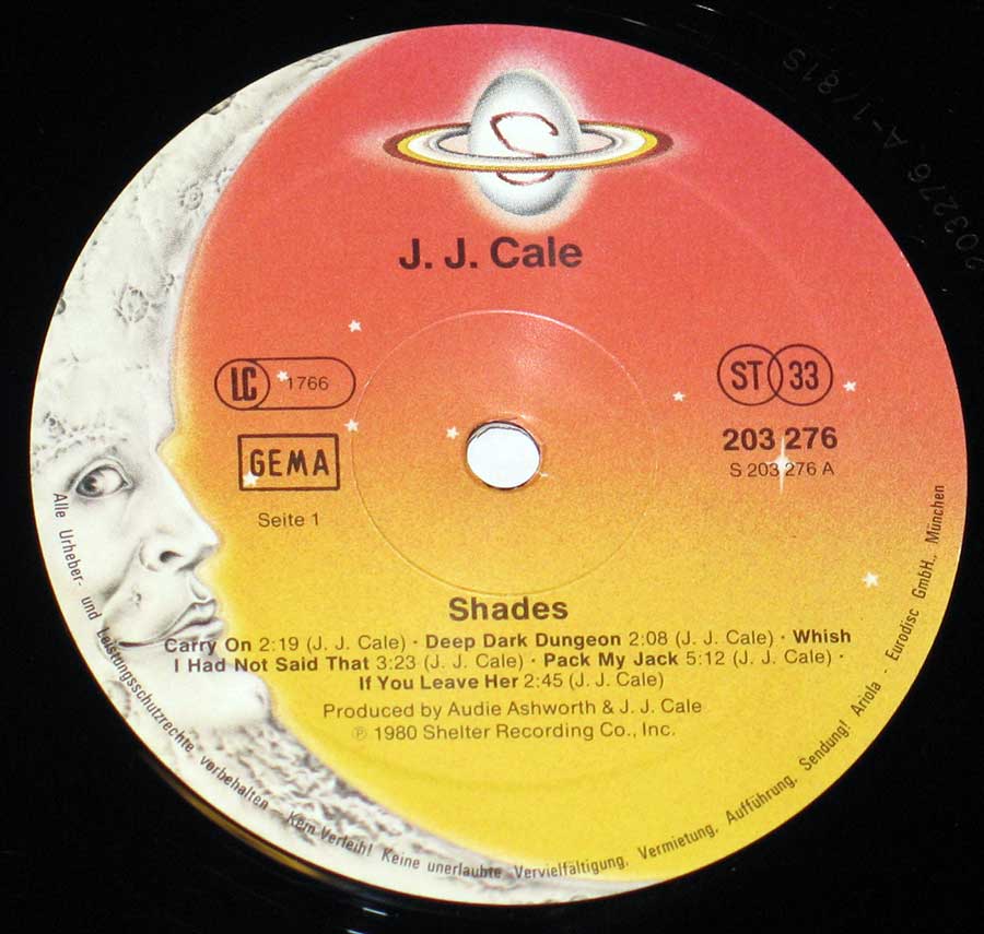 "Shades" Record Label Details: Orange to Yellow Colour with White Moon Shelter Recording Company 203 276 ℗ 1980 Shelter Recording Sound Copyright 
