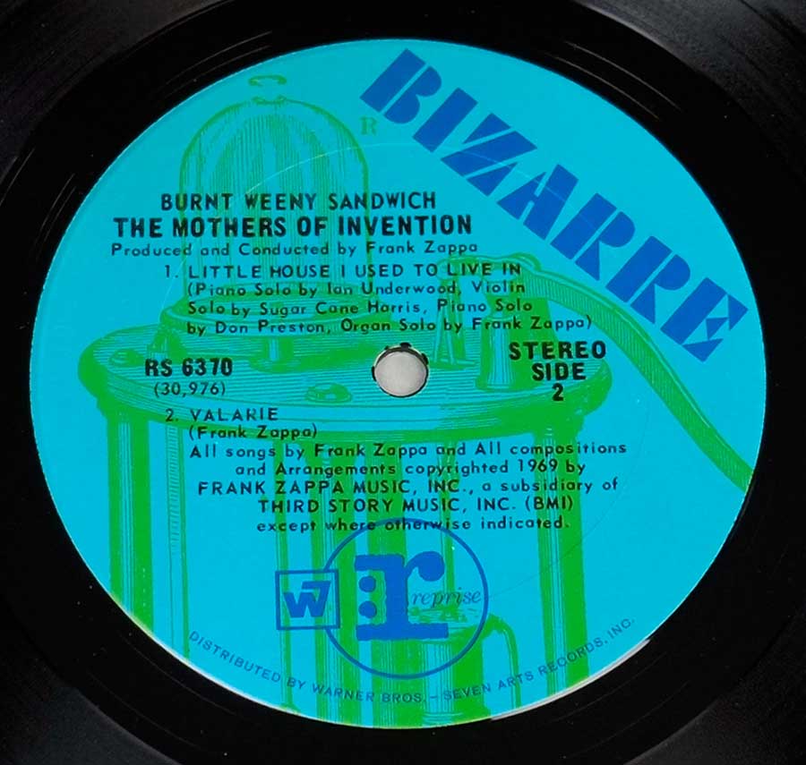 Close up of record's label MOTHERS OF INVENTION BURNT WEENY SANDWICH USA RS 6370 BLUE BIZARRE FOC Side Two