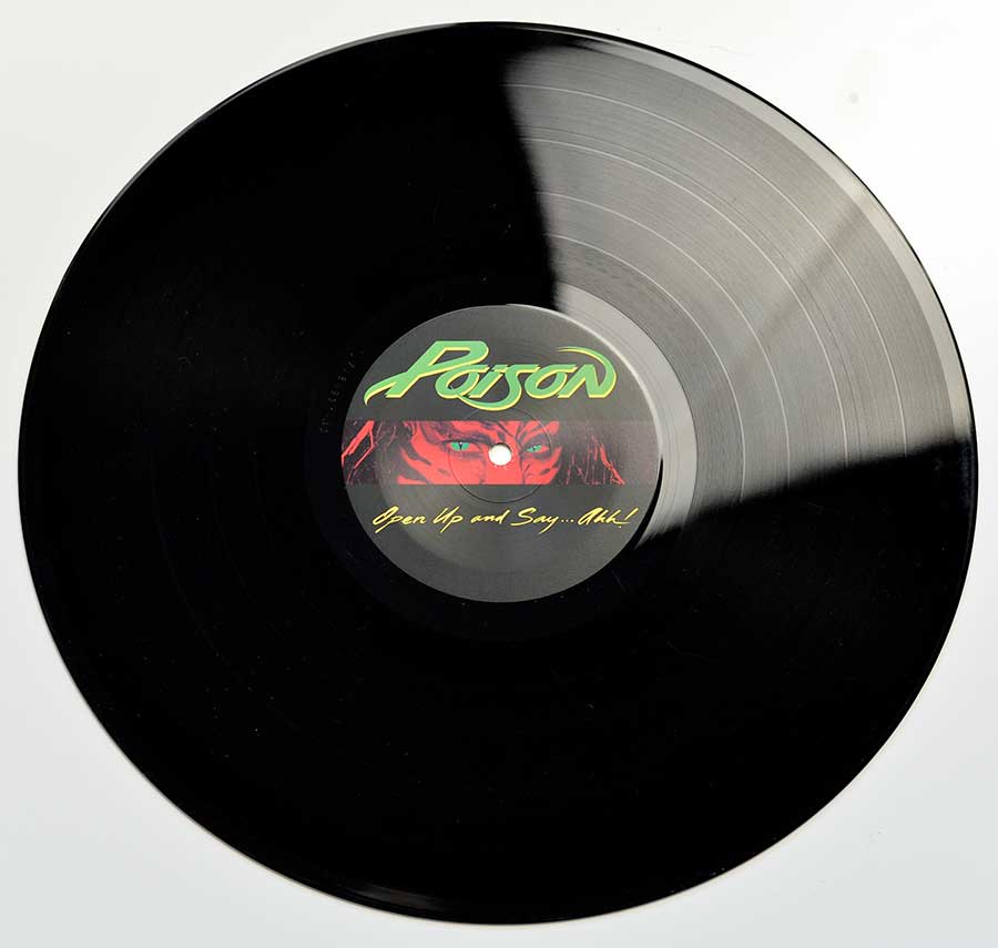 Photo of record Side One: of POISON - Open Up And Say Ah censored Album Cover 
