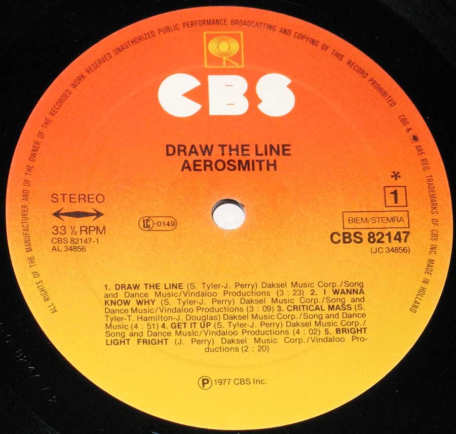 Close up of record's label AEROSMITH - Draw The Line 12" VINYL LP ALBUM Side One