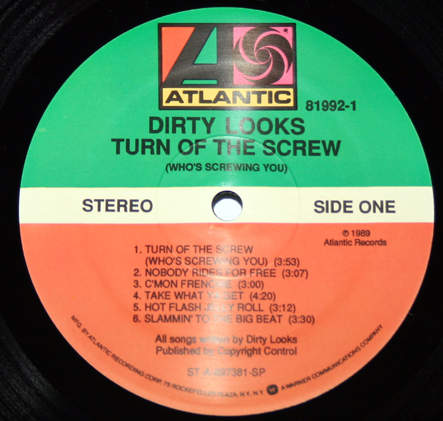 Close up of record's label DIRTY LOOKS - Turn of the Screw (Who's Screwing You) 12" Vinyl LP Album Side One
