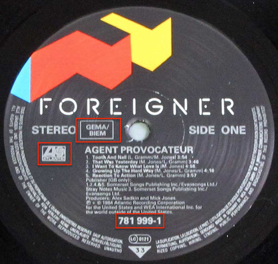 Close up of record's label FOREIGNER - Agent Provocateur Side One