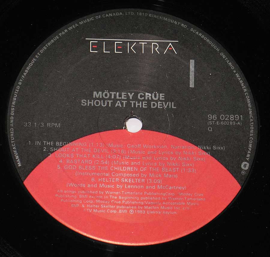 Close up of record's label MÖTLEY CRÜE - Shout At The Devil Gatefold Cover 12" Vinyl LP Album Side One