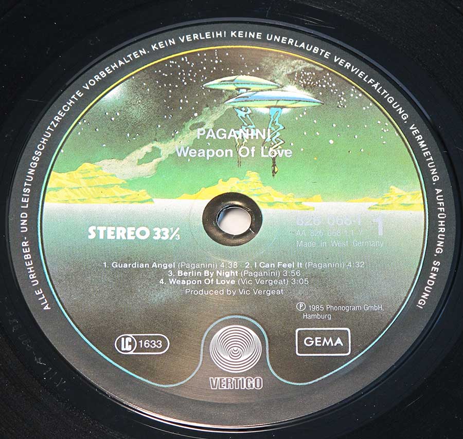 Close up of record's label PAGANINI - Weapon Of Love Side One