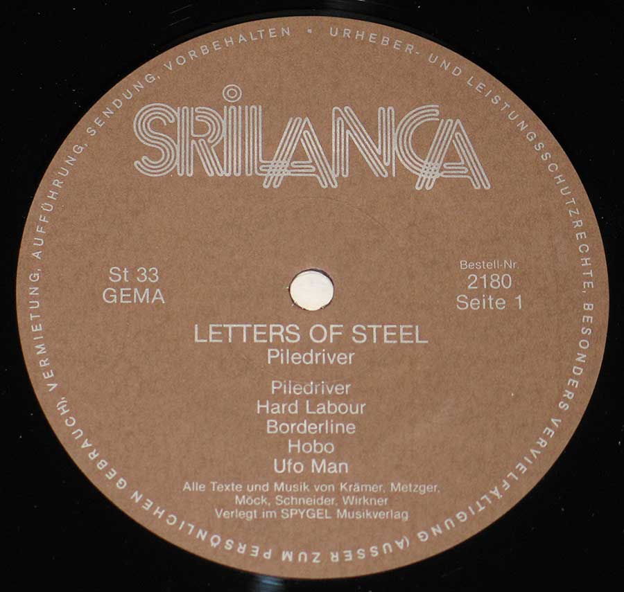 Close up of record's label PILEDRIVER ( Germany ) - Letters Of Steel 12" LP Vinyl Album Side One