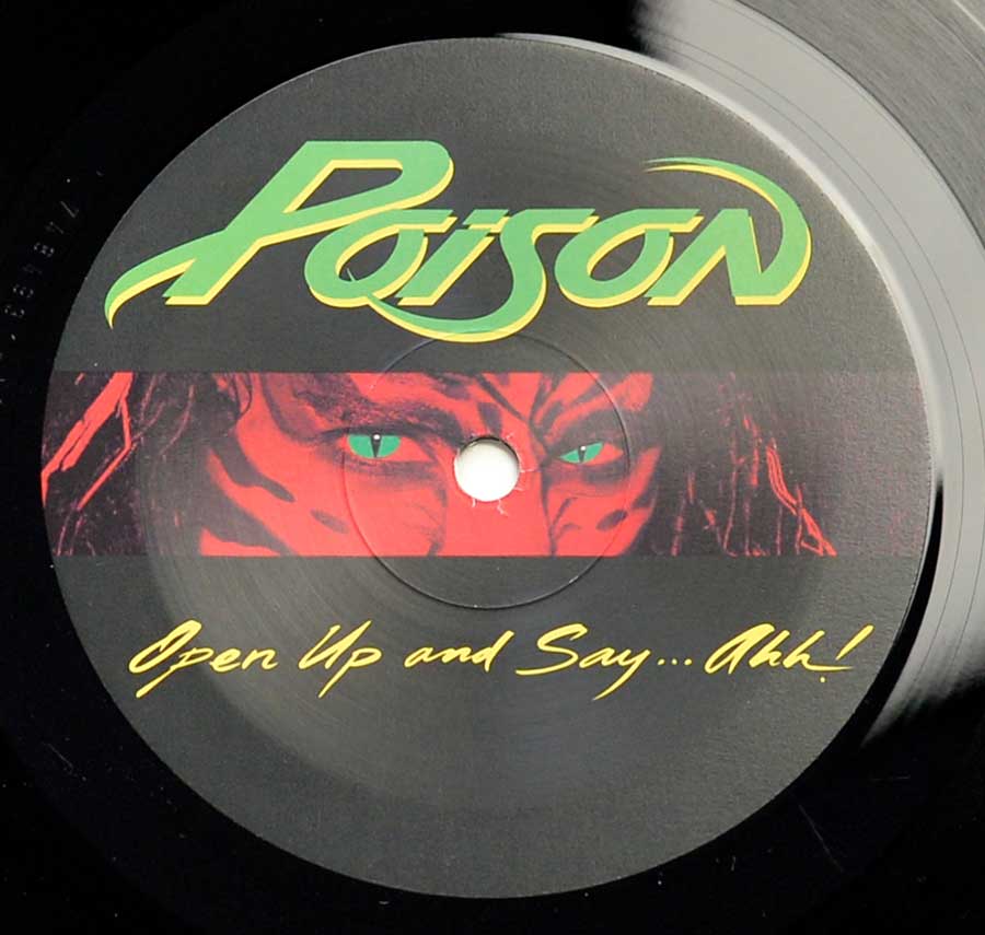 Photo of record label of POISON - Open Up And Say Ah censored Album Cover 