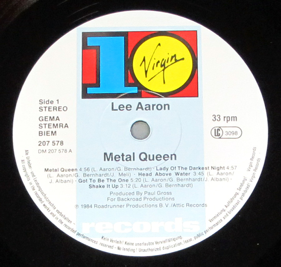 Close up of record's label LEE AARON - Metal Queen Virgin Records 12" LP Vinyl Album Side One