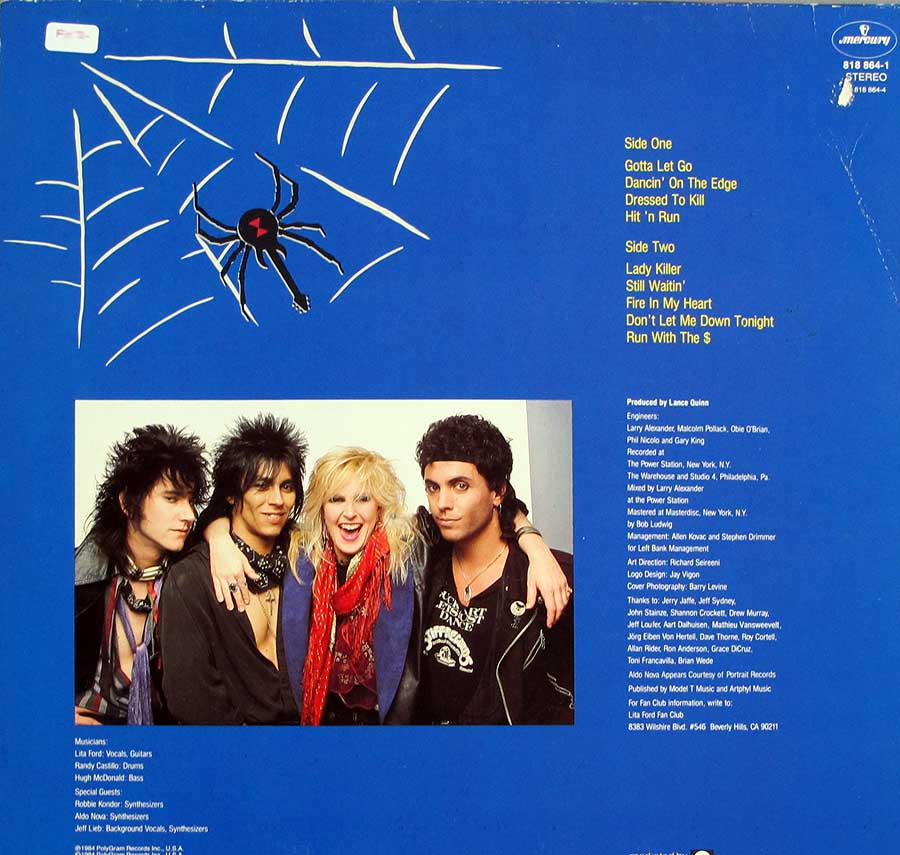 Group photo of the Lita Ford band and tracklisting on the album back cover