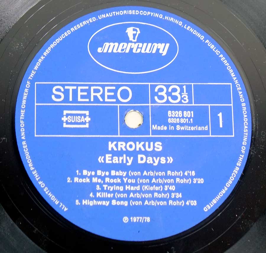 "Early Days 1975-78 by KROKUS" Blue Colour Mercury Record Label Details: MERCURY 6326 801, Made in Switzerland +SUISA+ ℗ 197/78 Sound Copyright 