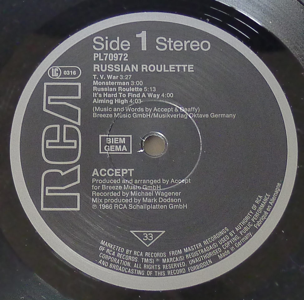 Close-up photo of the "RCA" Record Label of "Russian Roulette" with Catalognr PL70972 and BIEM/GEMA Right Societies  