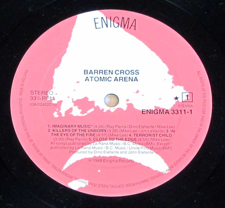 Close-up Photo of "BARREN CROSS - Atomic Arena " ENIGMA Pink and White Record Label