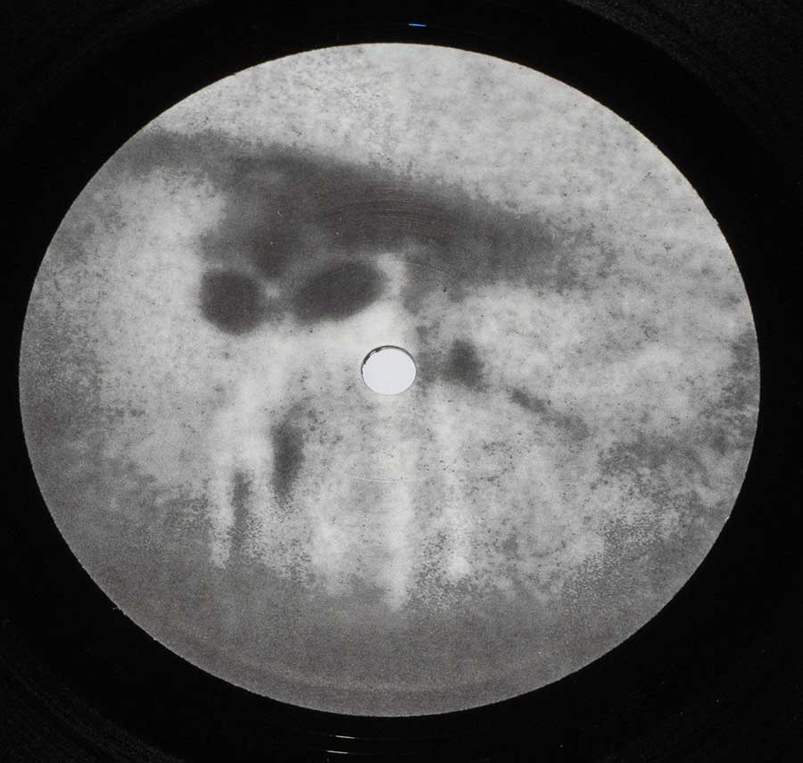 Close up of record's label DEAD BEAT - The Innocence Of Nihilism incl Booklet 10" Vinyl Record Side One