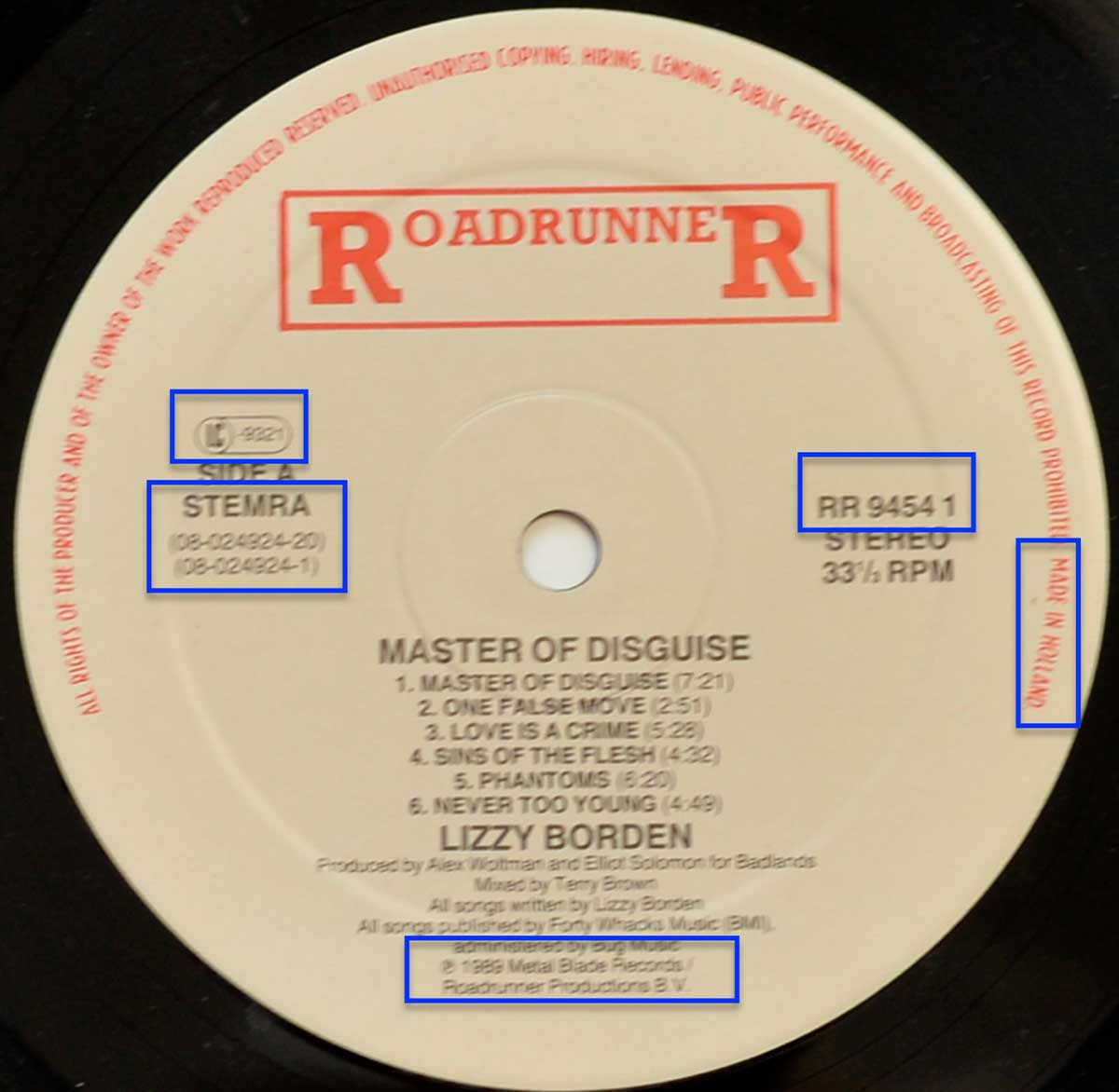 High Resolution Photo of the enlarged label LIZZY BORDEN Master of Disguise https://vinyl-records.nl