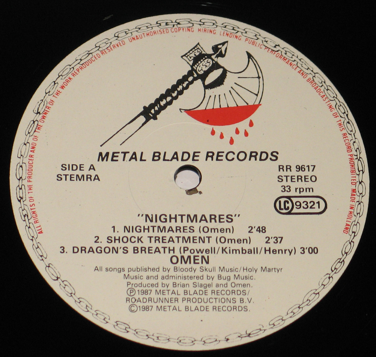 Close-up Photo of "Metal Blade Records" with Bloody AXE Record Label  