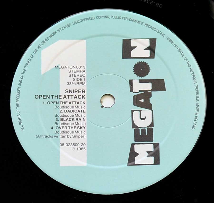 Close up of record's label SNIPER - Open The Attack Side One