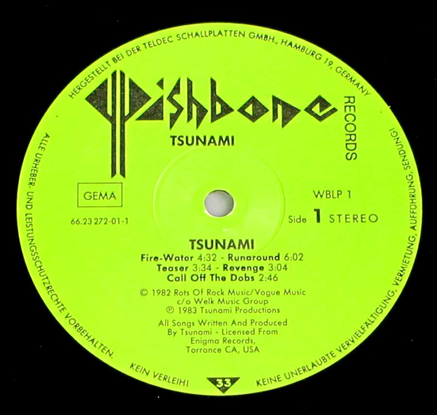 "Tsunami" Green Colour Wishbone Records Record Label Details: Enigma Records , Torrance CA, Wishbone 66,23 272-01-1 WBLP 1 © 1982 Rats of Rock, Vogue Music, Walk Music Copyright ℗ 1983 Tsunami Productions Sound Copyright 