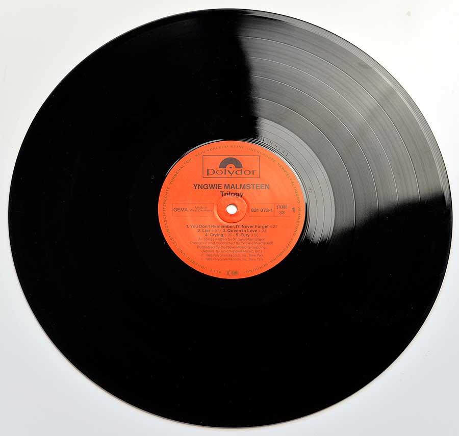 Photo of Side One of YNGWIE MALMSTEEN - Trilogy 12" Vinyl LP 