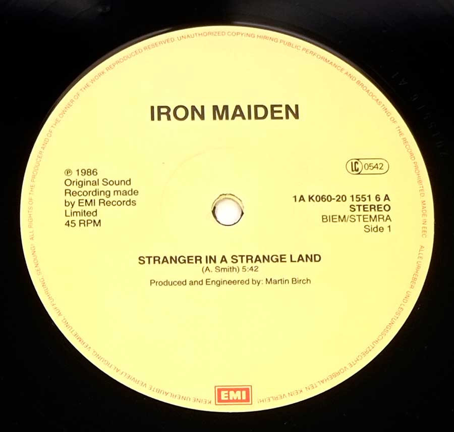 Close up of record's label IRON MAIDEN - Stranger in A Strange Land 12" Maxi Side One